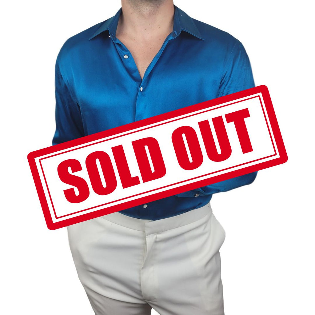 model wearing a mens turquoise long sleeve silk dress shirt by 1000 kingdoms