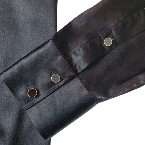 close up of the cuff and buttons of a black silk shirt for men from 1000 kingdoms