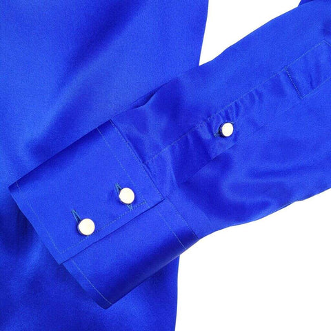 close up of the cuff of a blue silk shirt for men